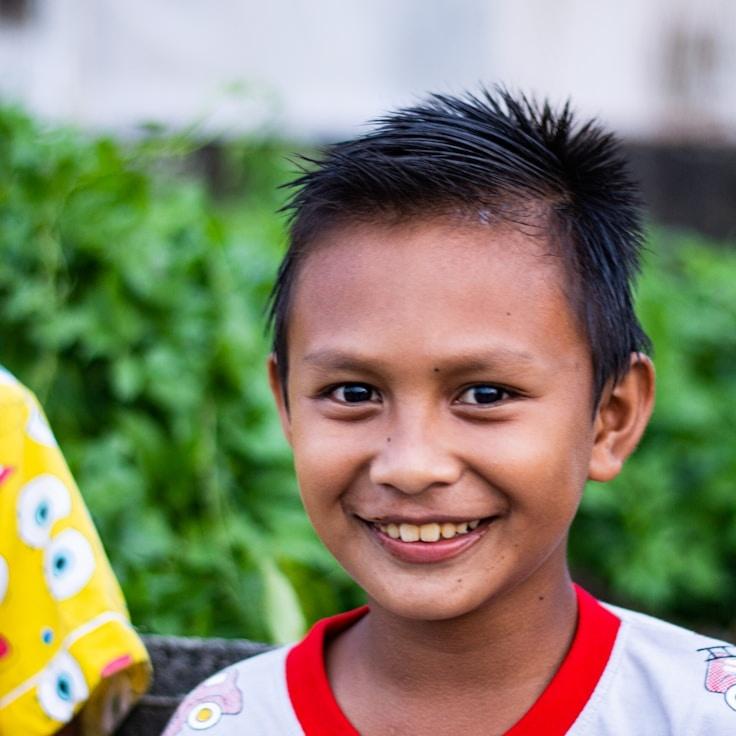 Portrait of Riley Chen, group coordinator and fusion cooking expert